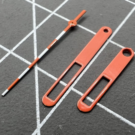 Orange and white watch hands with red trim for Ronda 515 quartz movement, 15mm set.