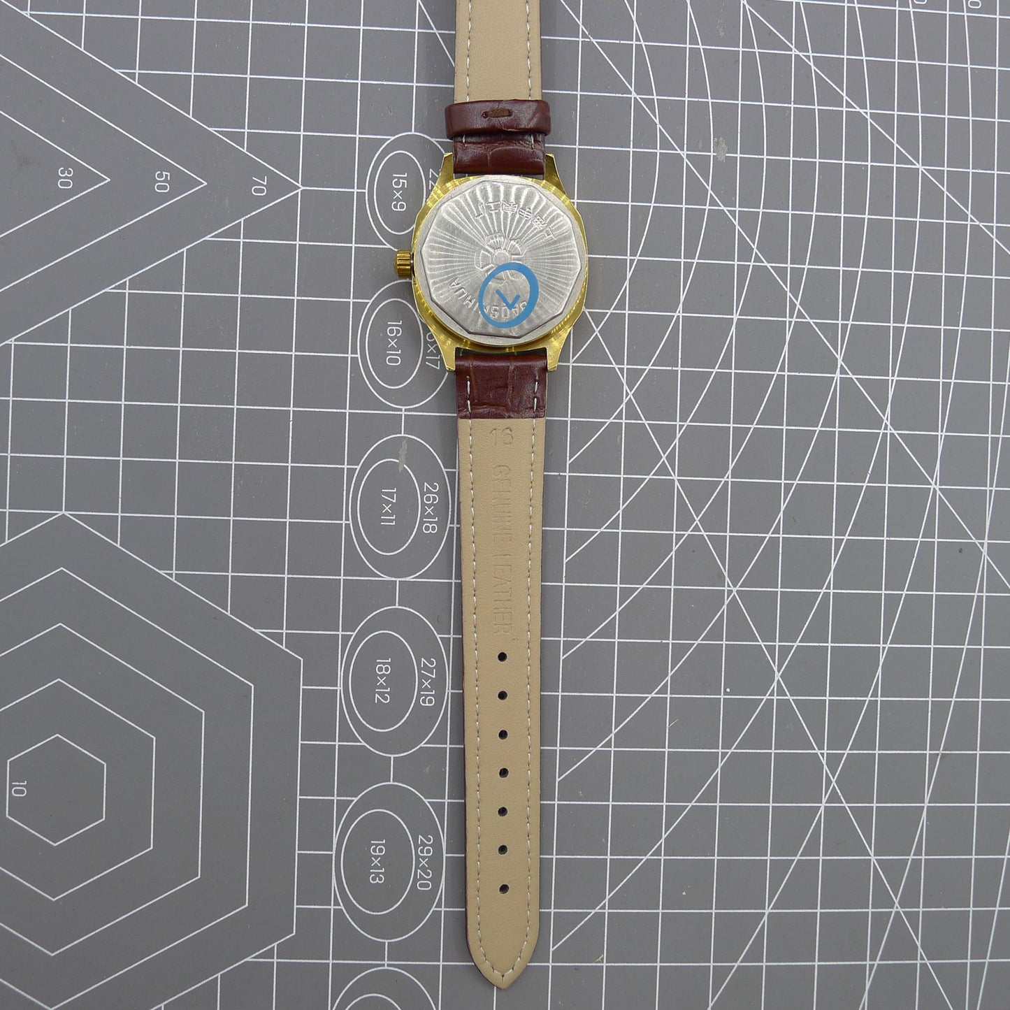 Shanghai 33mm manual mechanical watch with blue dial, gold markers, square case, 17 jewels movement.