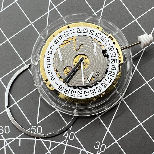ISA 8171 quartz watch movement with date at 4, white dial, 6 hands, Swiss made mechanism.