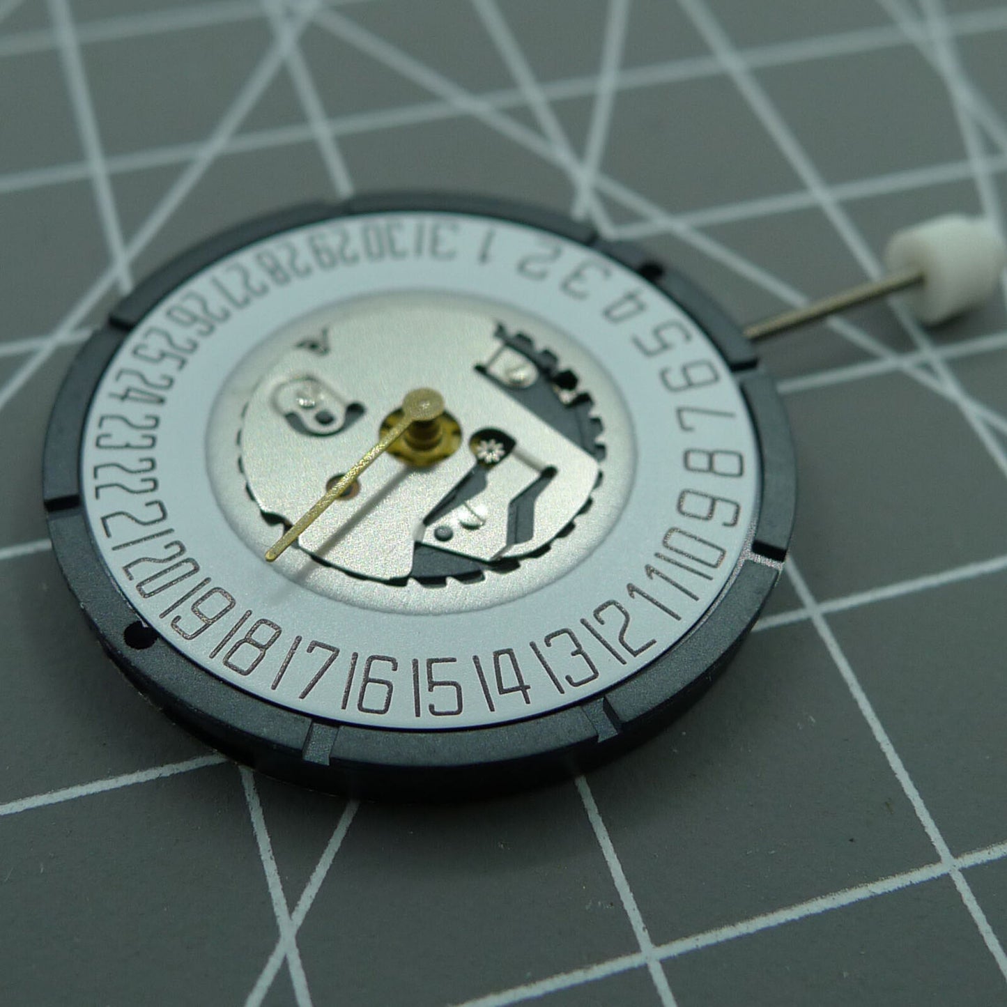 Swiss ISA 2331 watch part with black dial, quartz movement, and date display at 6 o'clock for precise timekeeping.