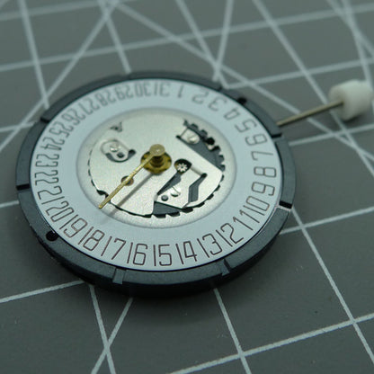 Swiss ISA 2331 watch part with black dial, quartz movement, and date display at 6 o'clock for precise timekeeping.