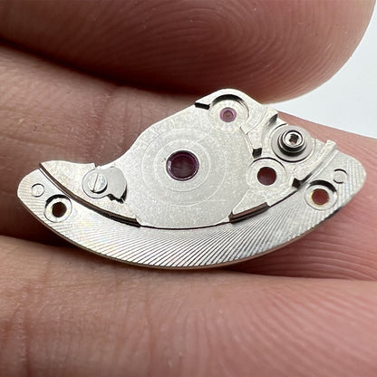 Generic Watch Parts 3135-105 barrel bridge replacement for 3135 movement, durable watch component by Generic Watch Parts.