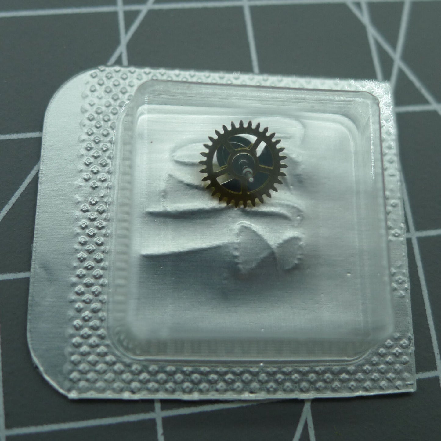 Ref.8020 ETA 7750 watch part showing 30-minute counting wheel for precise time tracking.