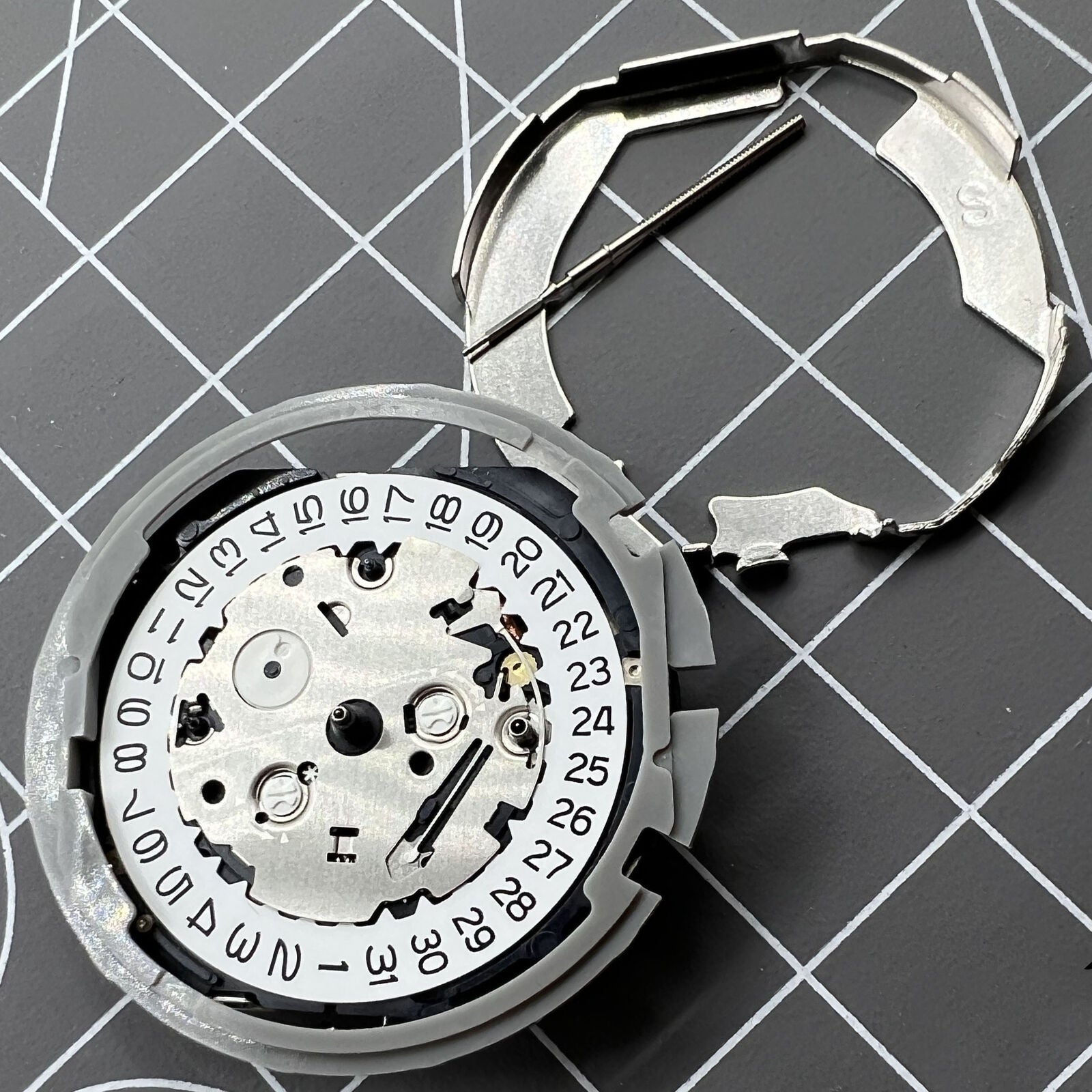Hattori Epson TMI YM82A quartz watch movement, precision timekeeping by Japan Made.