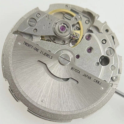 Miyota/Citizen 8215 automatic watch movement with white dial and date window at 6 o'clock for precise timekeeping.
