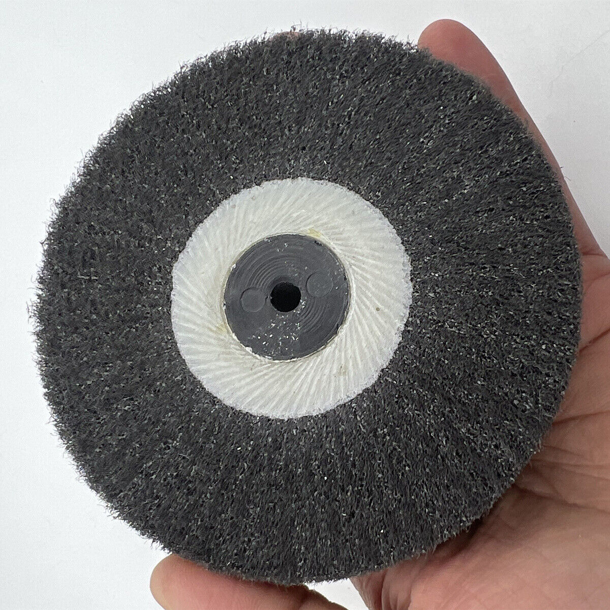 Bergeon 6085-E3 fine abrasive wheel for satin finishing metal watch parts, precision polishing tool.