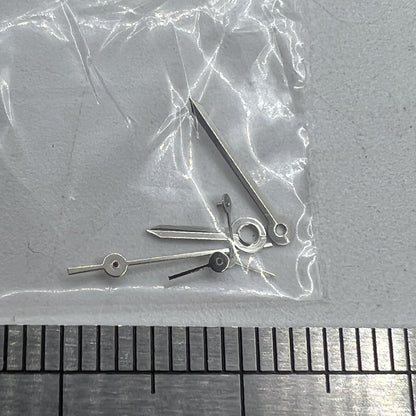 9.5mm silver-trimmed arrow-shaped watch hand for Epson VX3J VX9J VX7J VX3N VX9N VX42 models, precise fit.