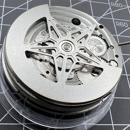 Dandong Silver watch featuring hollow star moon phase and automatic mechanical movement, elegant accessory.