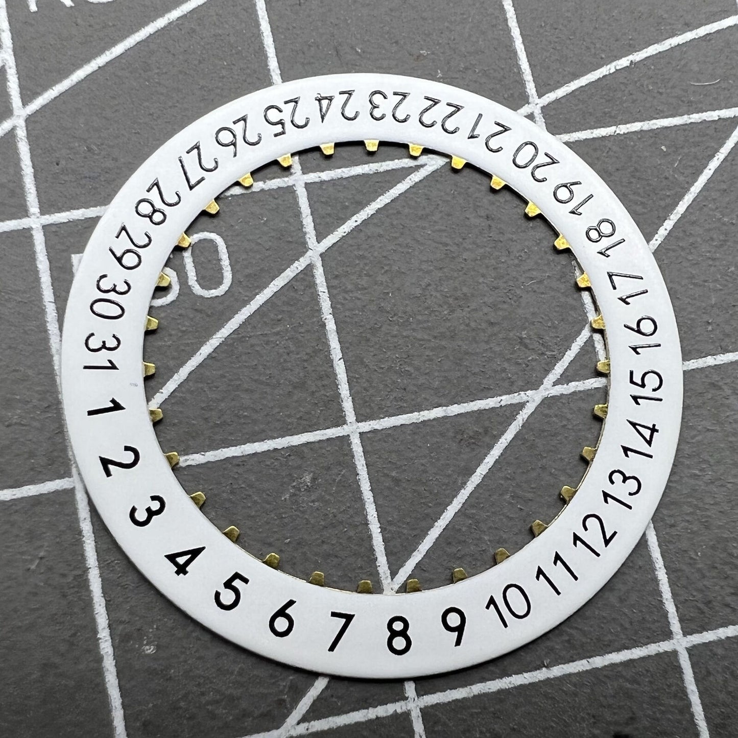 OM Font Date Disk featuring clear date wheel for ETA 2824 Date At 6 watch movement, precise replacement part.