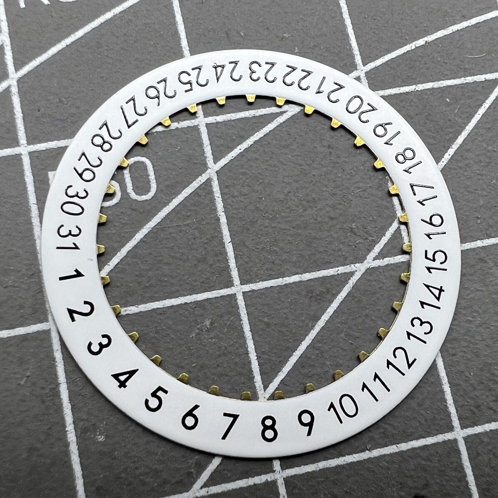 OM Font Date Disk featuring clear date wheel for ETA 2824 Date At 6 watch movement, precise replacement part.