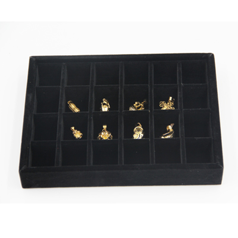 Gray velvet stackable jewelry organizer tray with grid compartments for elegant accessory storage.
