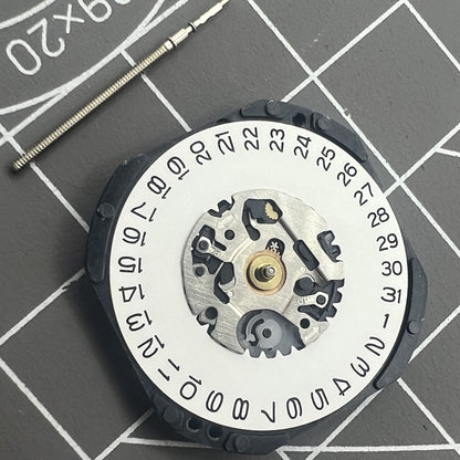Hattori Epson TMI VX3K quartz watch movement with date at 3, precision Japan-made mechanism.
