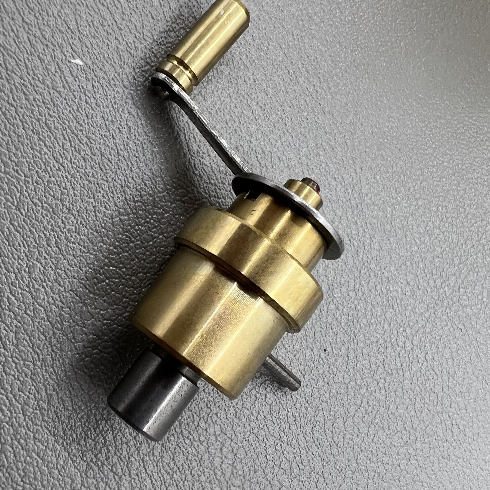 Swiss Bergeon precision mainspring winder with spare barrels for ETA calibres, essential watch repair tool.