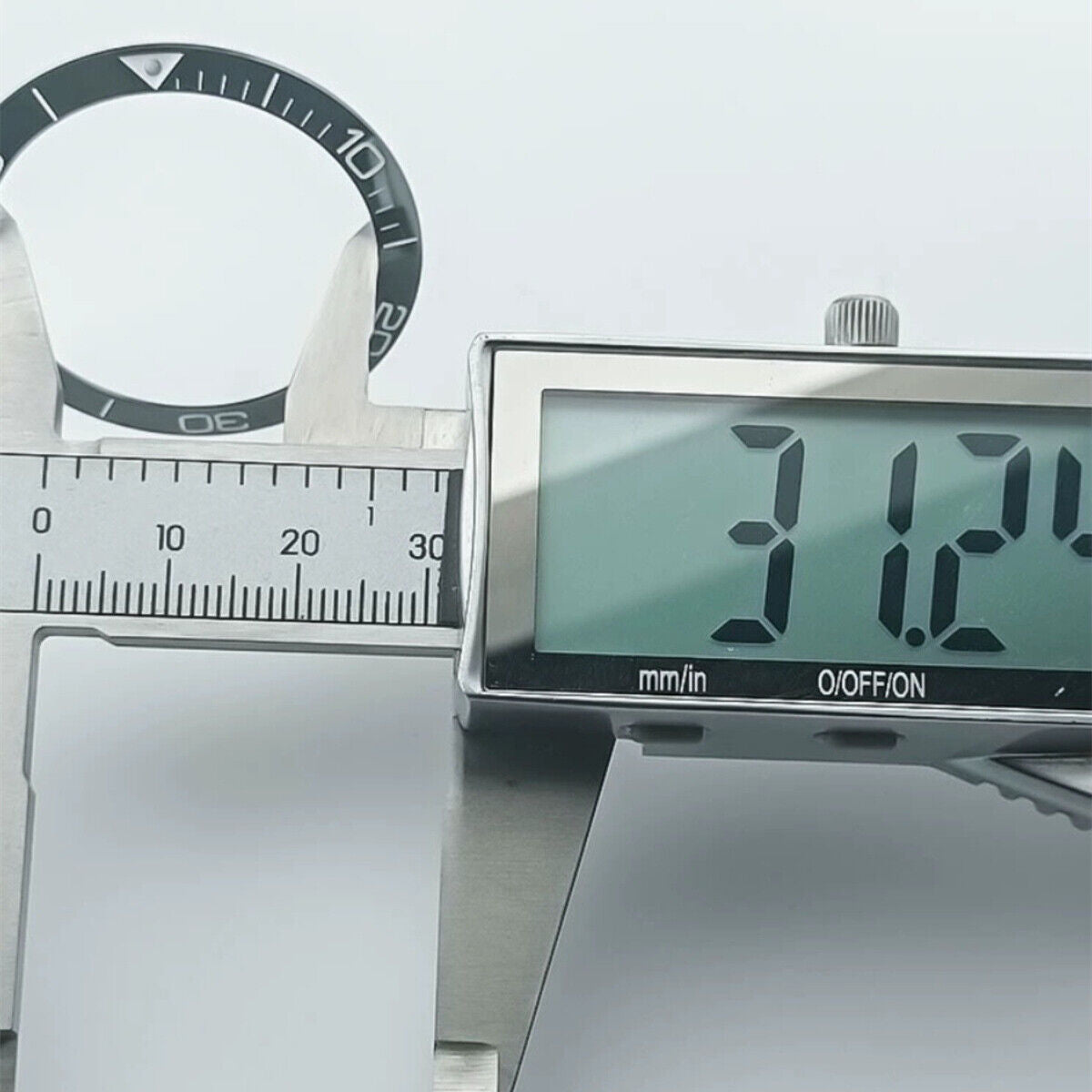 Blue luminous ceramic 38.5mm bezel ring by Conquest, designed for durability and stylish watch enhancement.