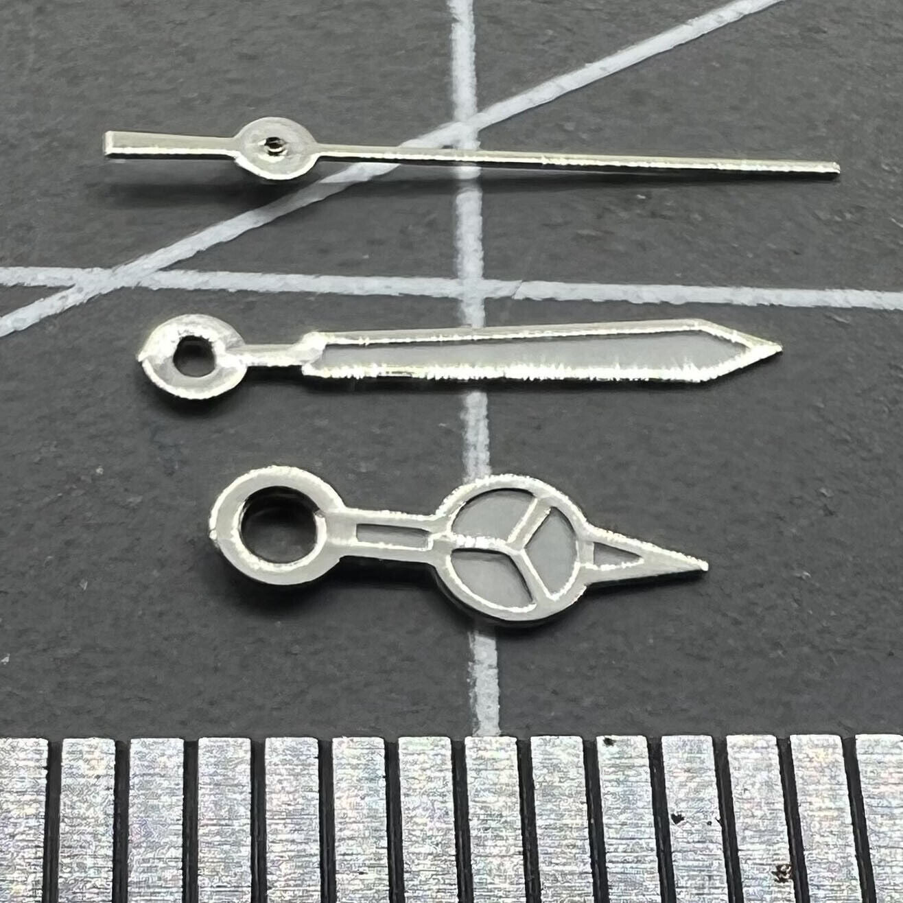 Luminous watch hands set for Miyota 2035 movement, 13mm/11mm/8mm lengths, perfect for precise timekeeping.
