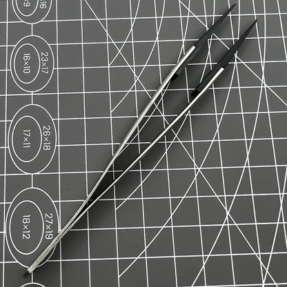 Stainless steel Carbon Fiber Head Tweezers for precise watch repair tasks.