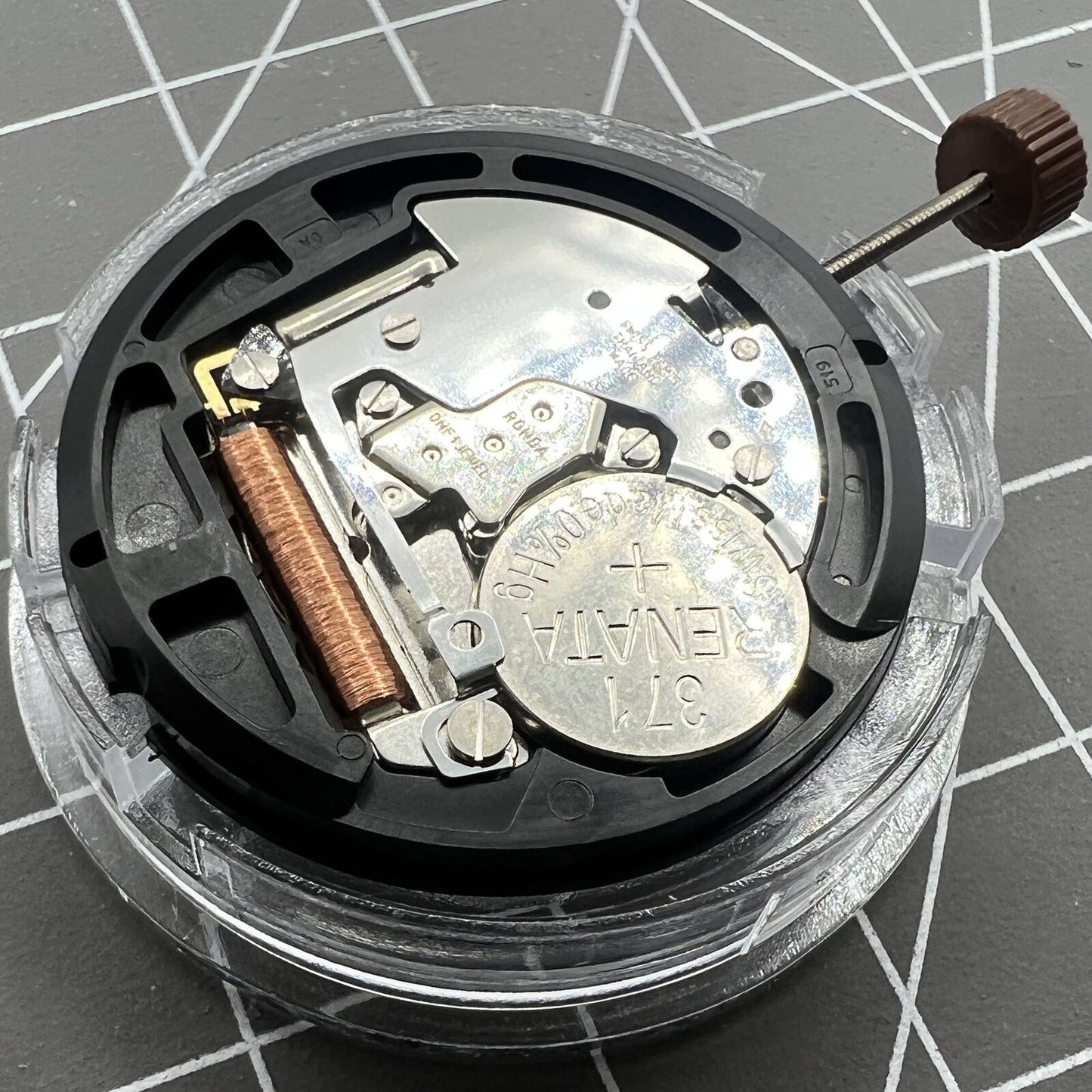 Swiss Ronda 509 quartz watch movement with black date disk at 3 o'clock, precise timing by Ronda.