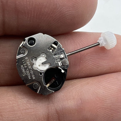 Sunon PE11 quartz watch repair parts displaying hour, minute, and second hands for accurate timekeeping.