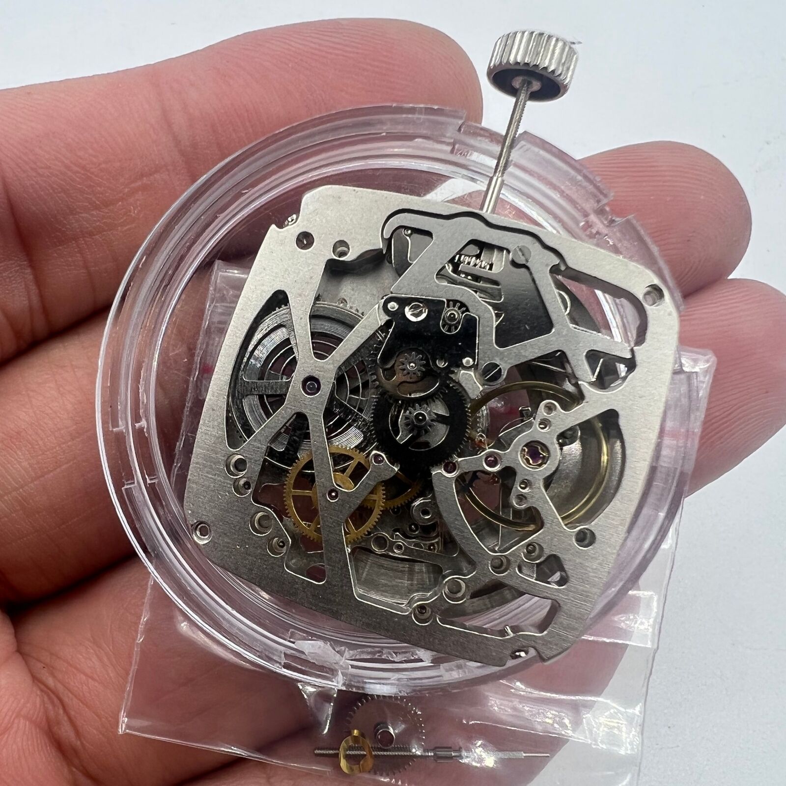 Tianjin Seagull ST25 automatic watch movement with silver hollow 3 hands, square design for luxury watchmaking.