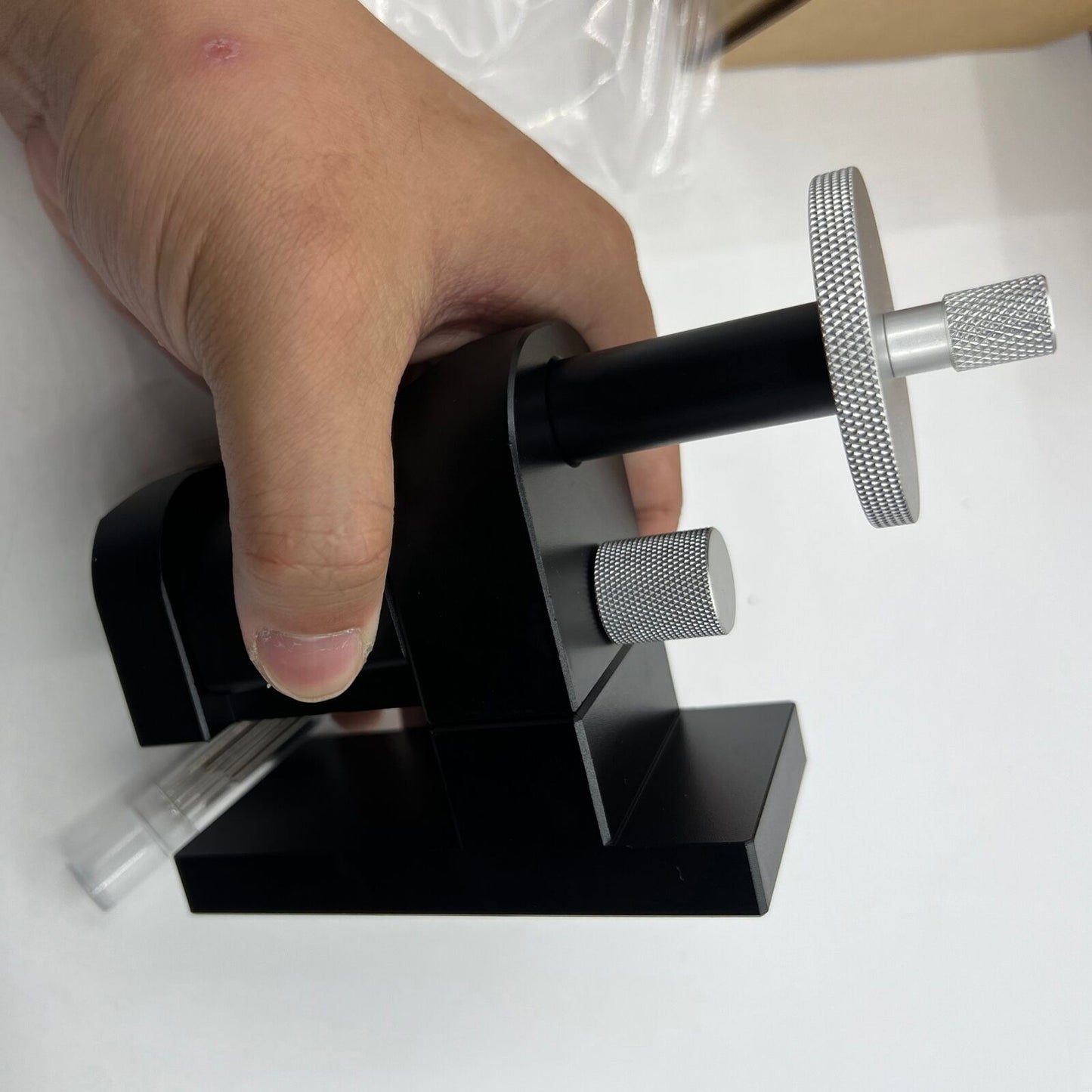 Adjustable watch strap link pin remover tool for precise bracelet chain adjustments.