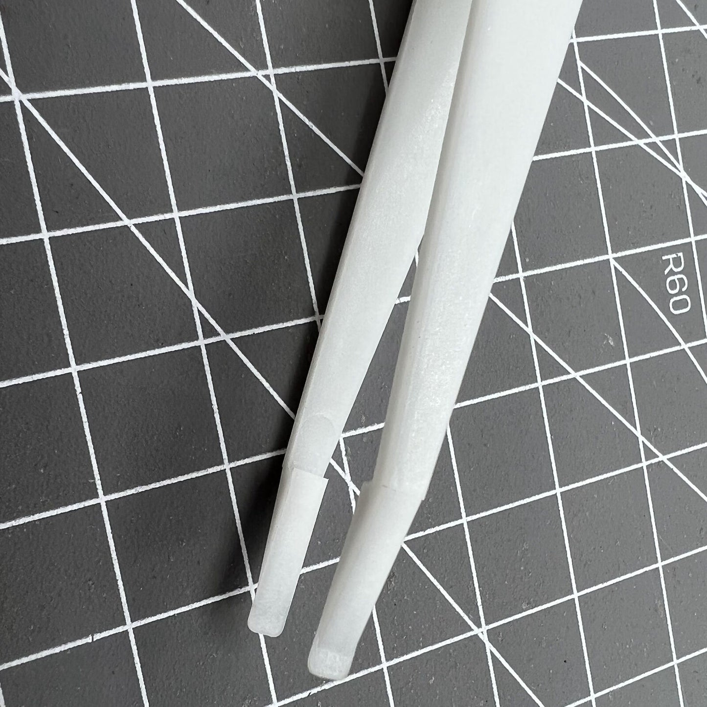 Bergeon 6460 Swiss Made plastic battery tweezer, precision tool for watch battery replacement.