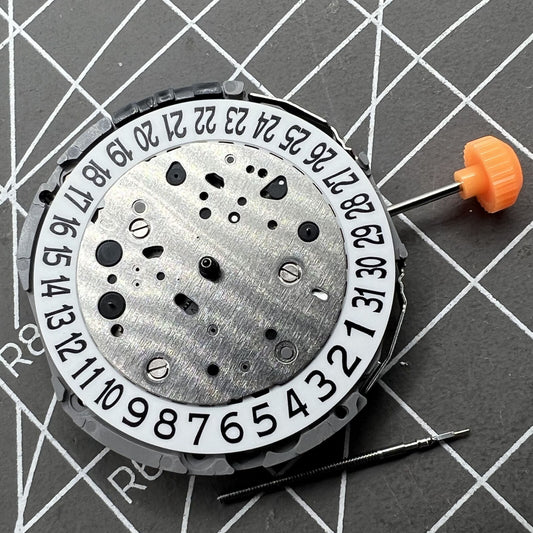 Miyota JP21 quartz movement with date display at 3 o'clock, reliable watch mechanism for accessories.