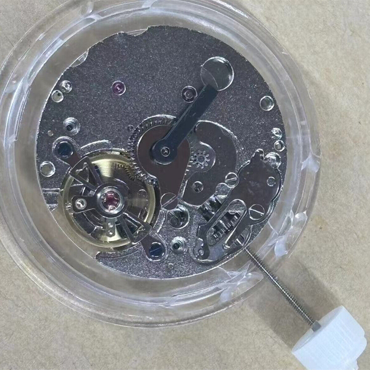 China Made Lady watch with 3 hands, automatic mechanical movement, visible balance wheel at 6 o'clock.