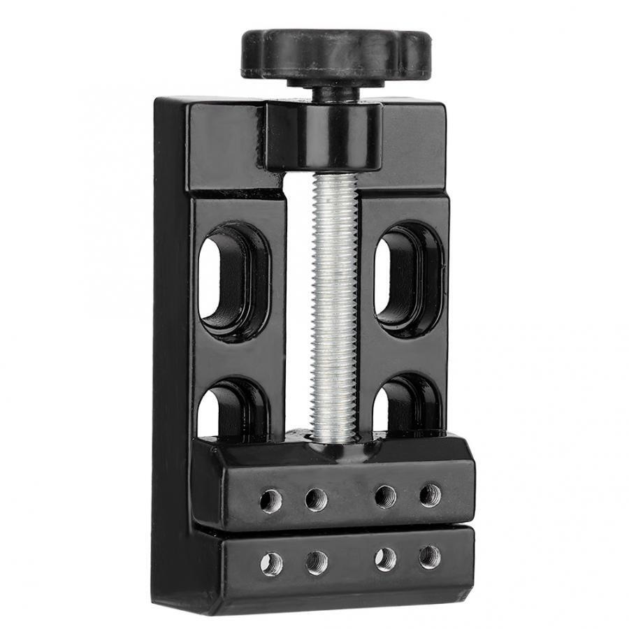 Mini electric drill with flat vice clamp, ideal for detailed jewelry crafting and precision work.