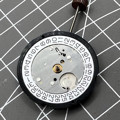 Swiss Ronda 505 quartz watch movement with date display at 3 o'clock for precision timekeeping.
