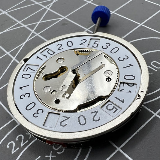Swiss Ronda 5040B Quartz watch movement with date function, precise timekeeping for repairs and upgrades