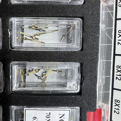 Golden and white luminous watch hands set for hour, minute, and second by 44Sets, ideal for watch repairs and customization.