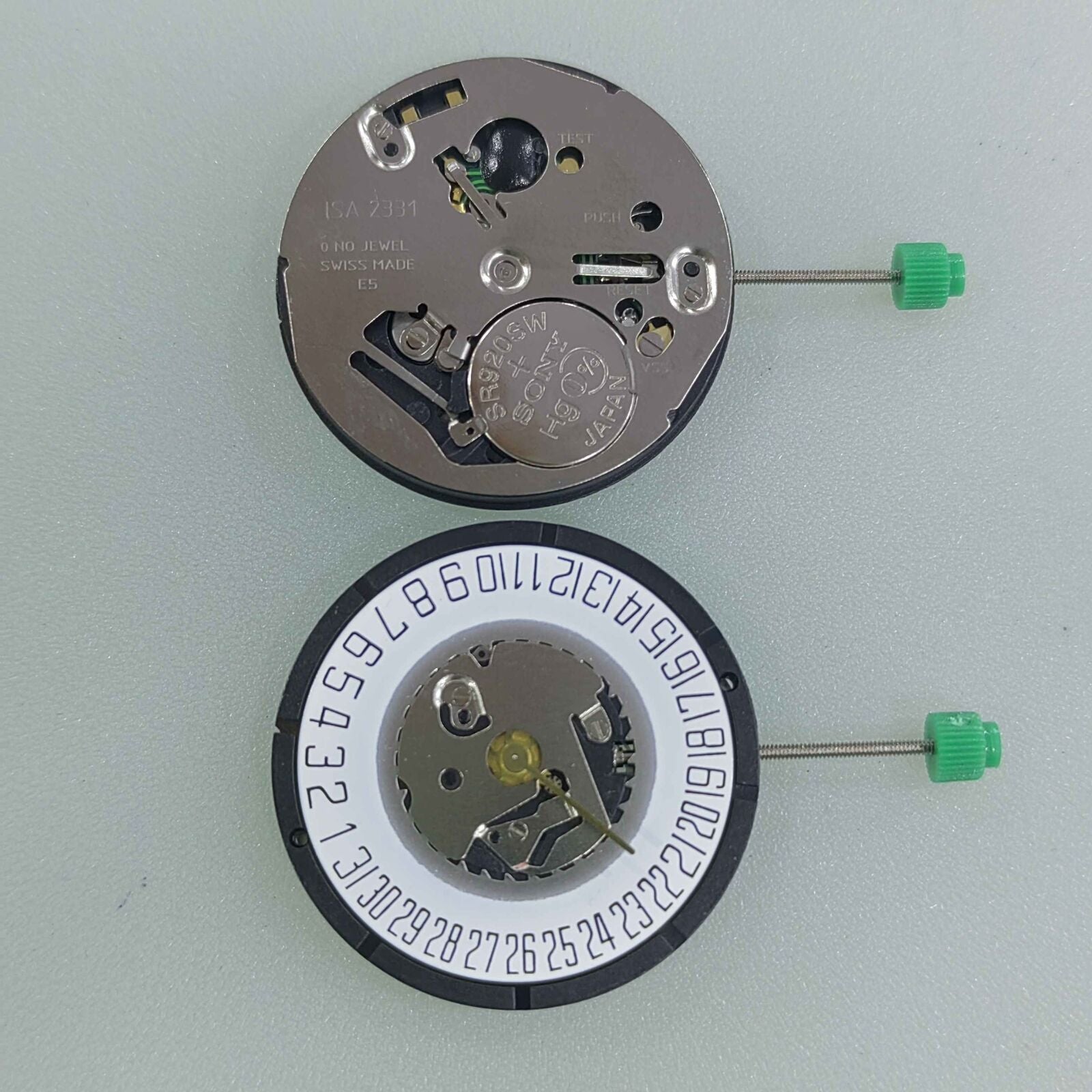 Watchmakers ISA 2331 white dial watch accessory with quartz movement, date display at 6 o'clock.