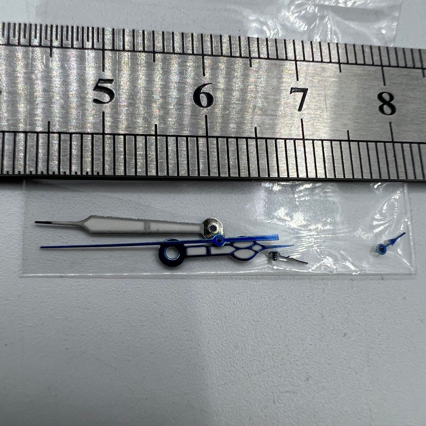 Blue trim green lume watch hands for Miyota OS10 and 0S10 movements, boosting style and readability.