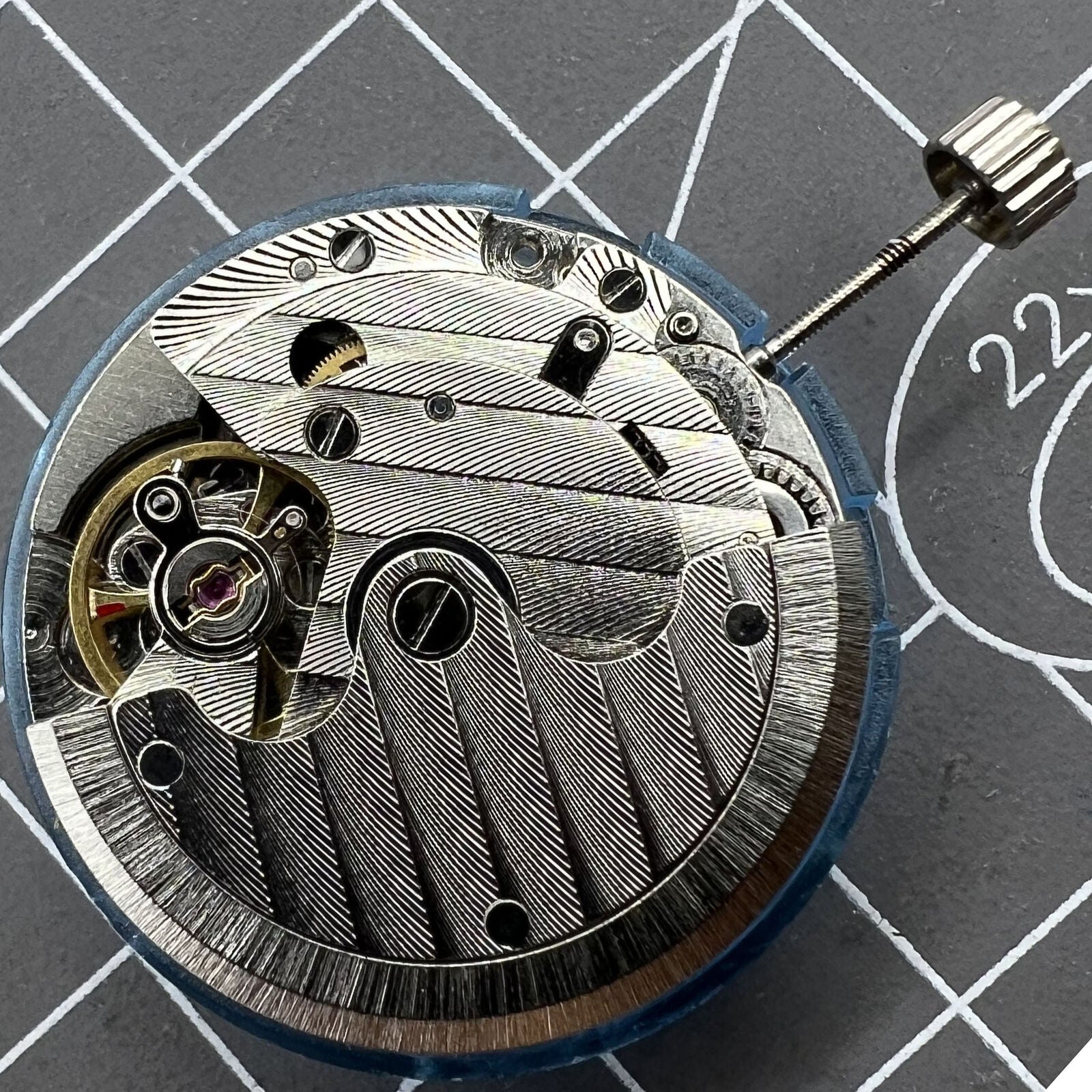 Tianjin T16 polished automatic watch movement, precise 8200 series mechanical replacement for watch repair and maintenance.