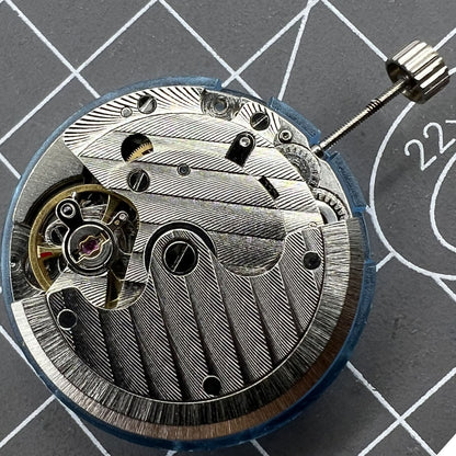 Tianjin T16 polished automatic watch movement, precise 8200 series mechanical replacement for watch repair and maintenance.