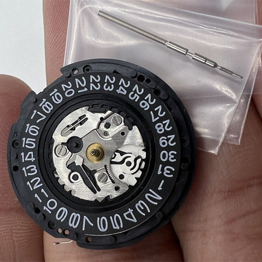 Seiko Japan Made YT57 watch accessory showcasing kinetic autoquartz movement with 3 hands and calendar.