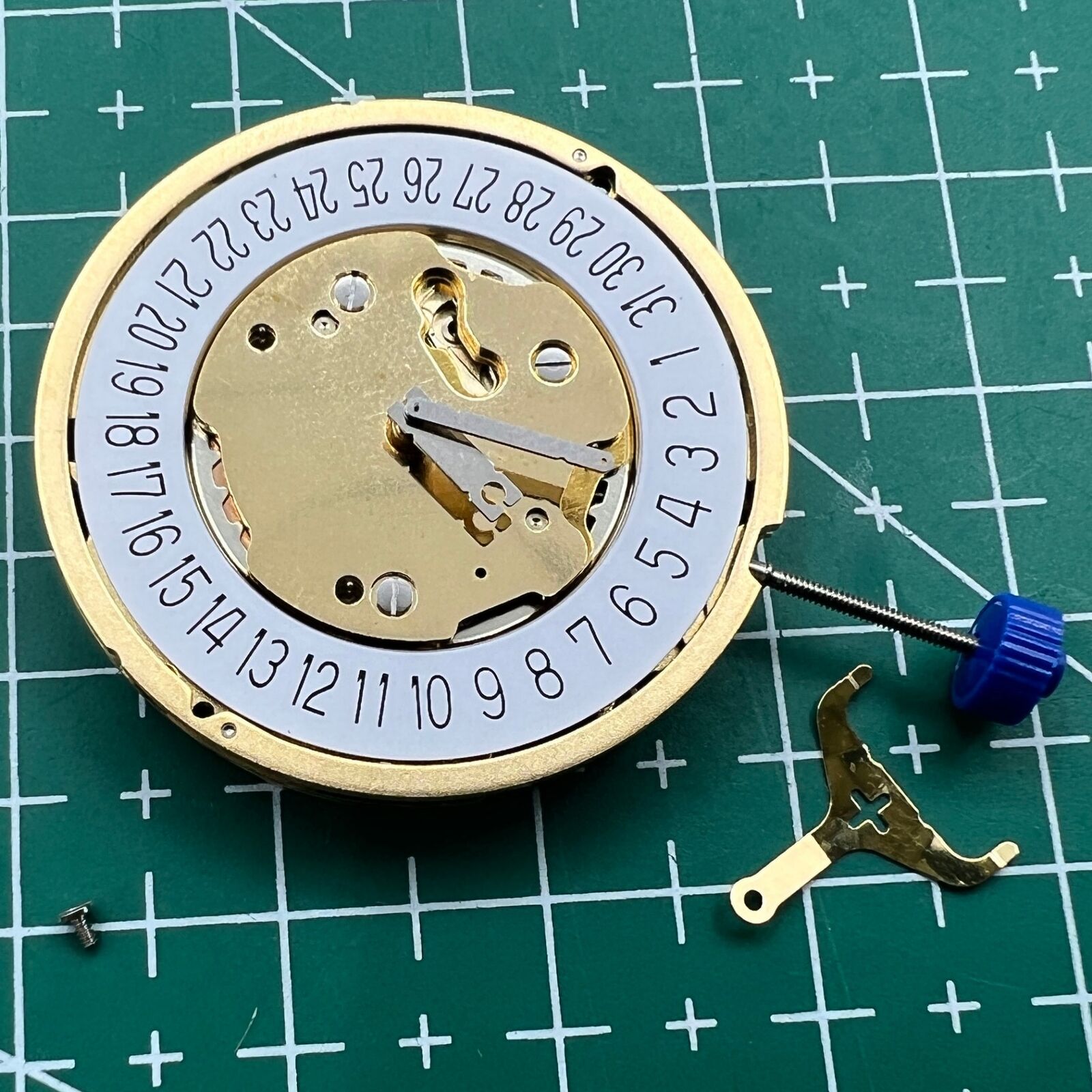Swiss Made Ronda 5030D quartz watch movement with date display at 6 o'clock, perfect for watch repair.