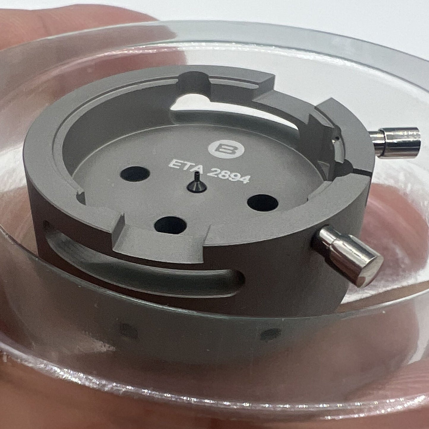 Swiss Tool Bergeon 7100 watch movement holder for ETA 2894-2, precision accessory enhancing watchmaker accuracy.