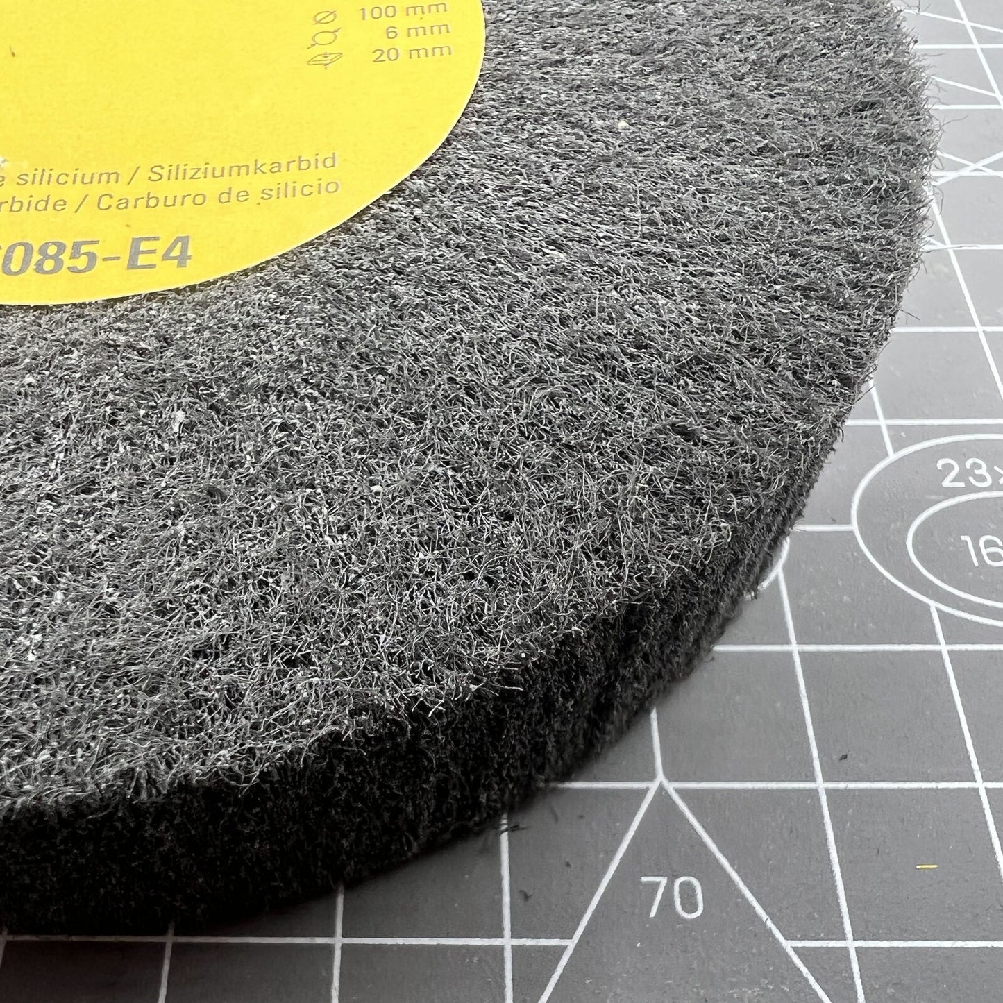 Swiss Bergeon 6085-E4 ultra fine abrasive wheel for satin metal finishing on watches, precise polishing tool.