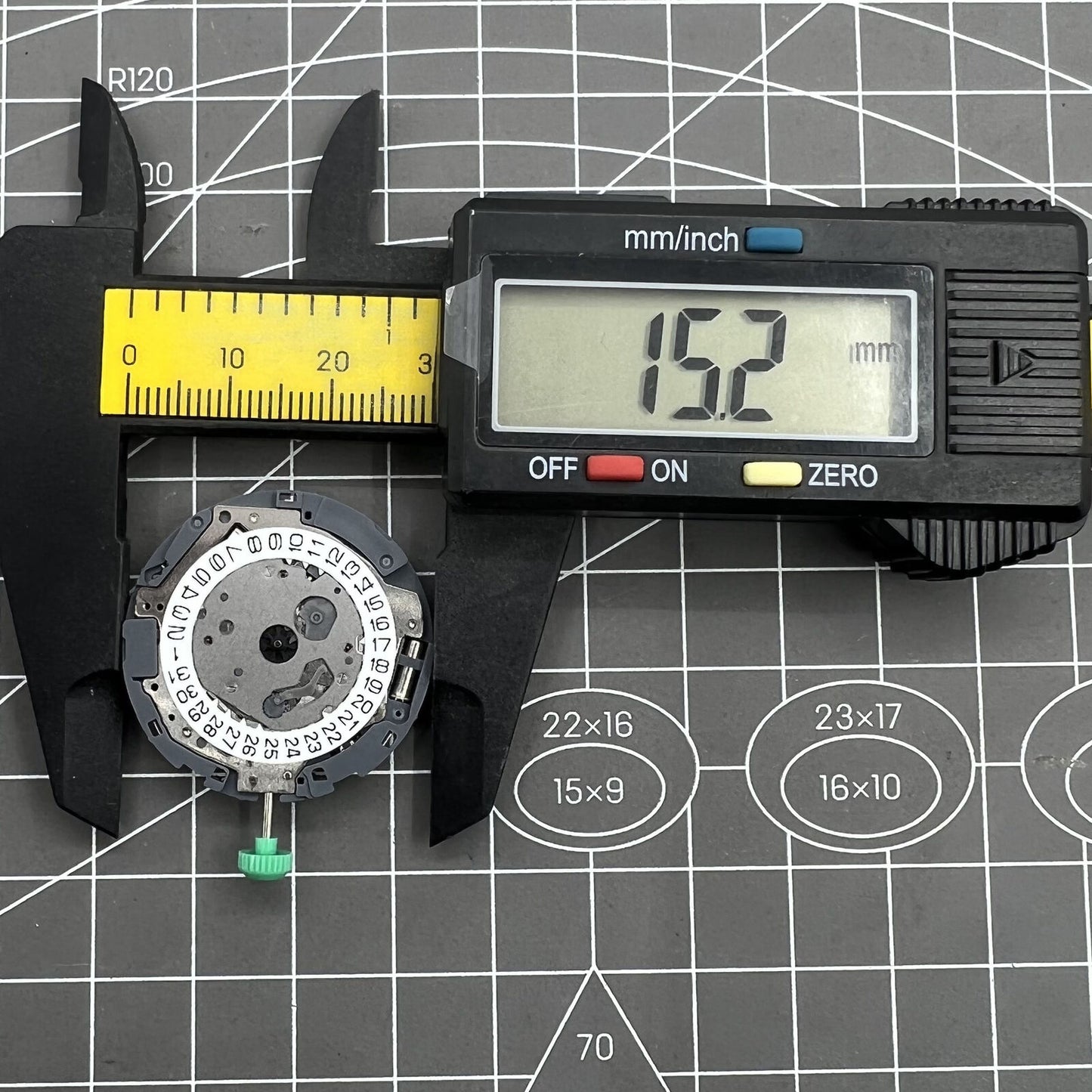 Miyota 0S11 quartz watch movement by Citizen, high-precision inner mechanism for reliable timekeeping.
