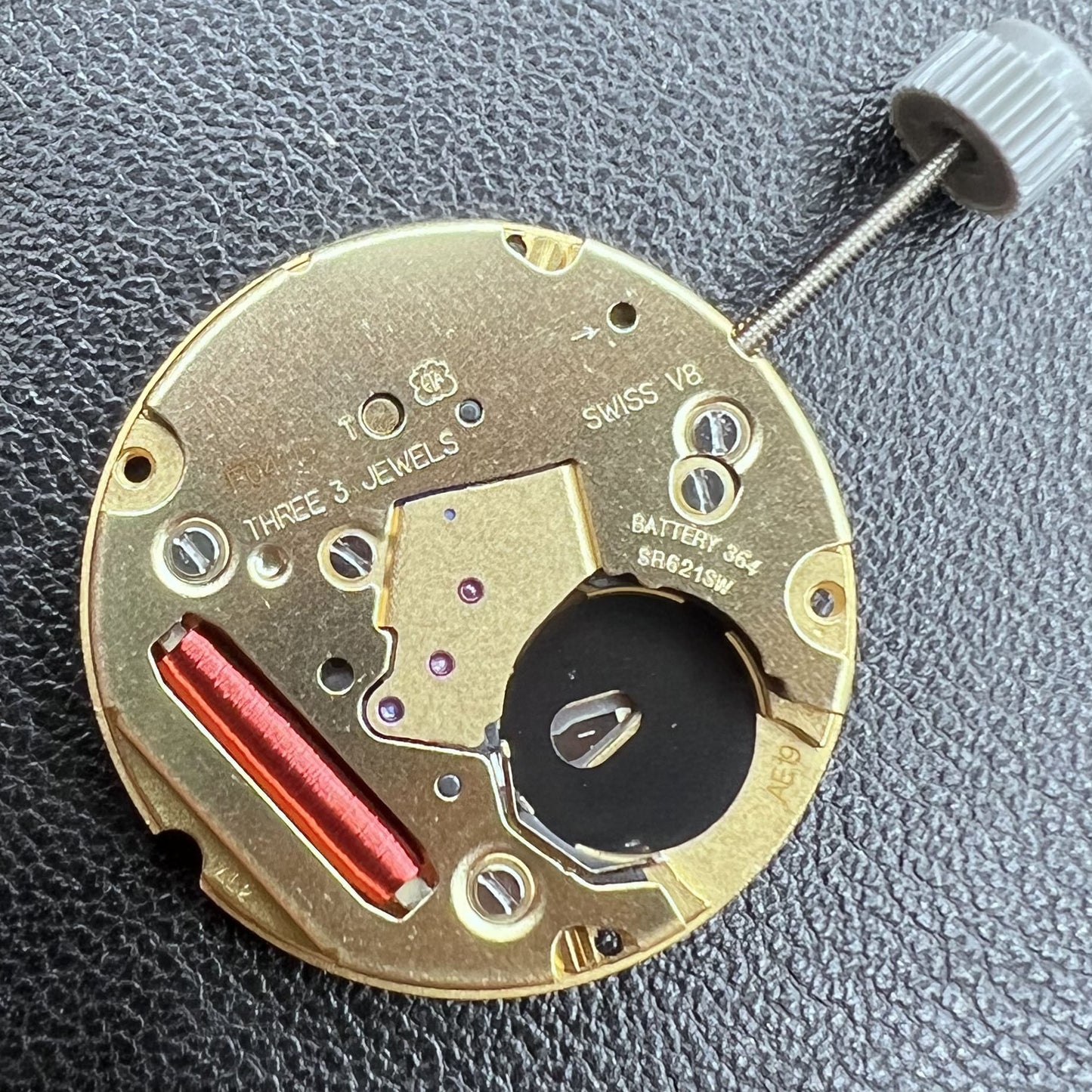 Swiss ETA F04.115 quartz watch movement with 3 hands and date display at 3 o'clock for precision timing.