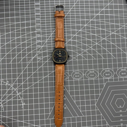 34mm Shanghai Factory manual mechanical watch with black dial, 19 jewels, shock-resistant design.