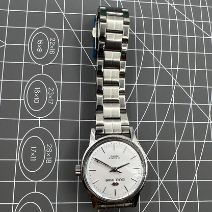 Beijing 31mm China-made manual mechanical watch with silver case and three hands, stylish and precise.