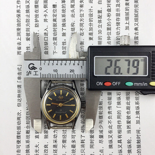 Black case Seagull ladies watch with golden nail markers, manual mechanical movement, and shock-resistant design.