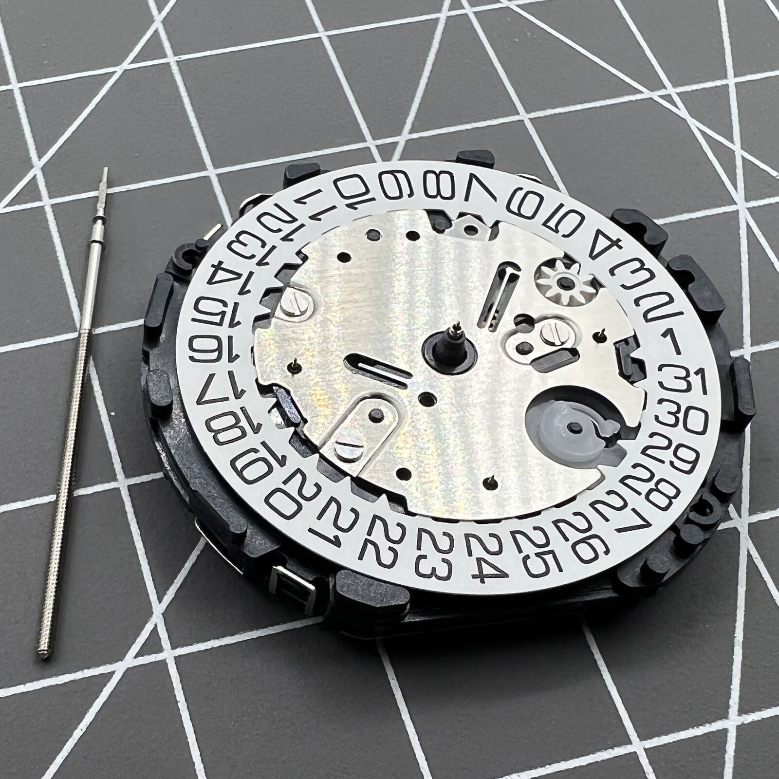 Hattori Epson TMI Japan VR33B quartz watch movement for precise timekeeping in accessories.