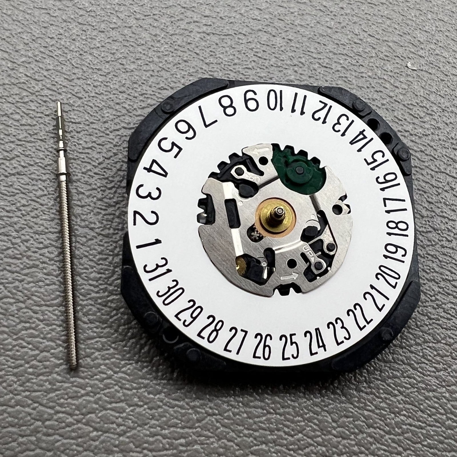 Japan Seiko 7N39C quartz watch movement close-up for precise timekeeping and durability.
