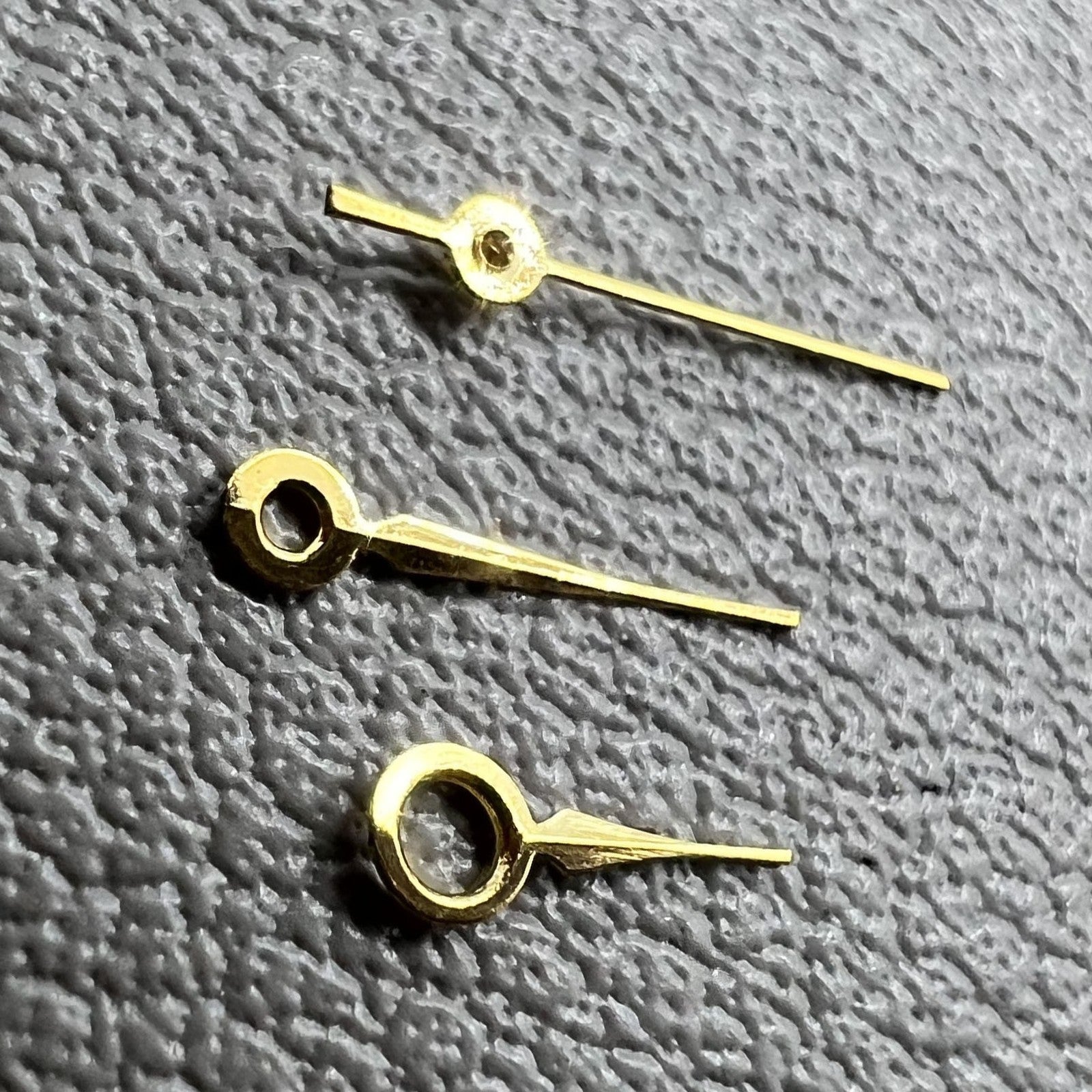 Golden watch hands set for Miyota 2035 movement, 2 sets, ideal for precise watch repair.