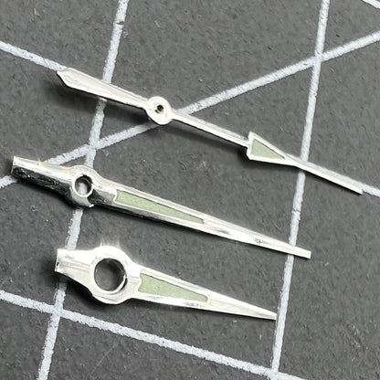 Silver-trimmed luminous watch hands for Miyota 2035 quartz movement, enhancing readability and style.