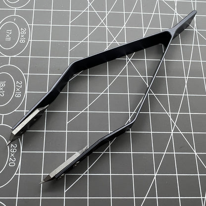 Stainless steel spring bar tweezer by 7825 for precise lug removal and watch strap fitting.