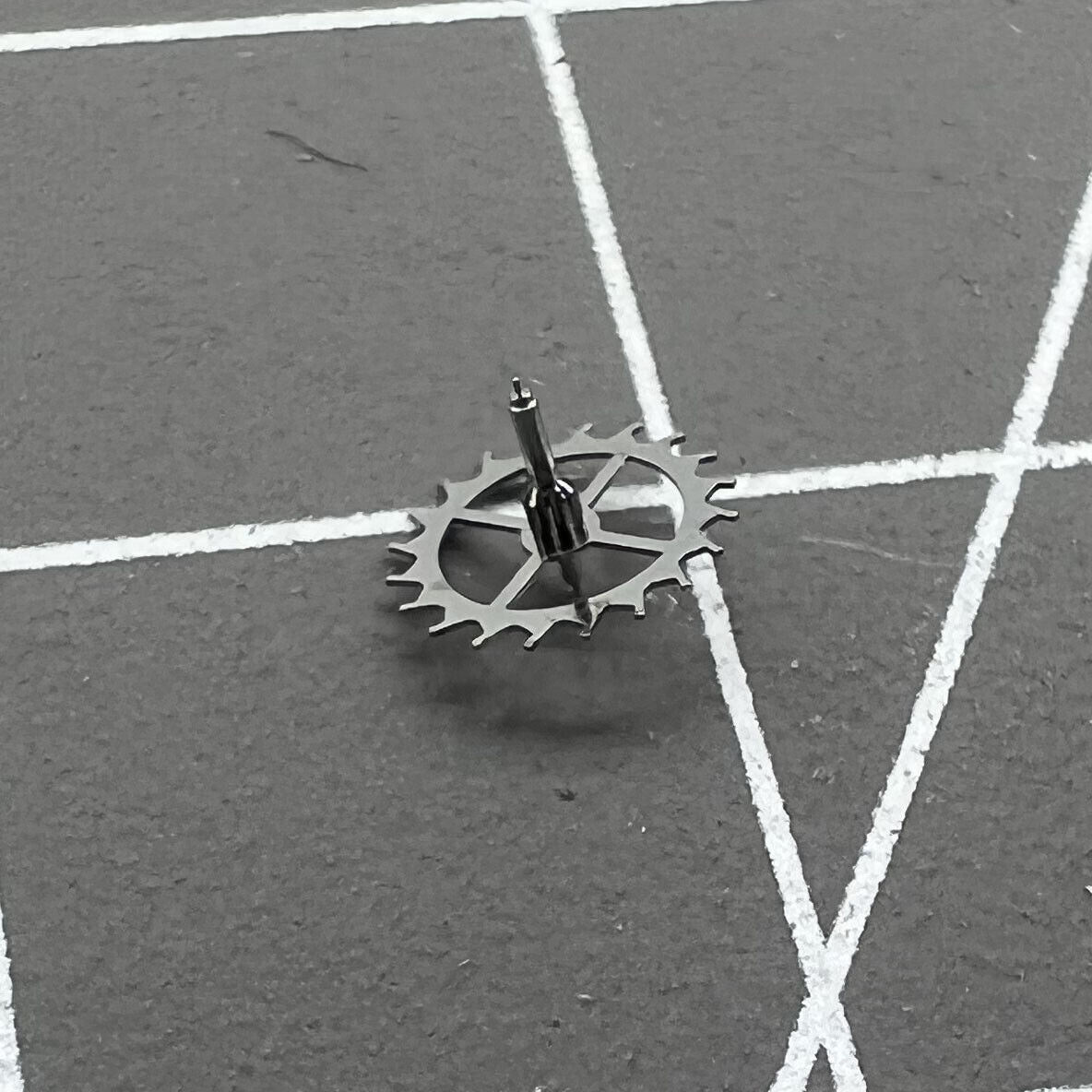 Escape wheel for Dandong 7750 chronograph movement, precision watch part ensuring accurate timekeeping.